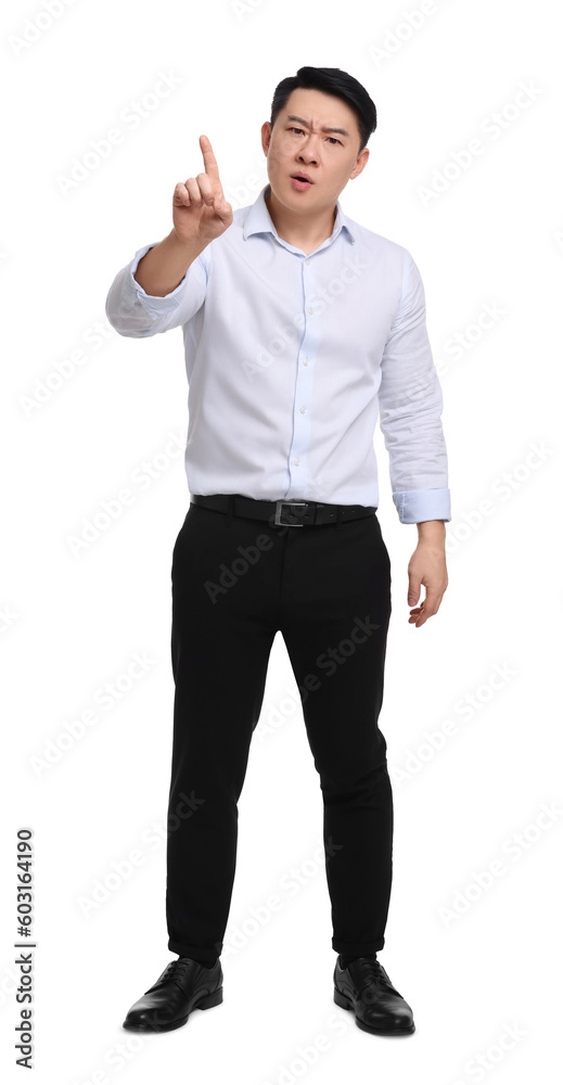 Angry businessman in formal clothes posing on white background Angry businessman in formal clothes posing on white background