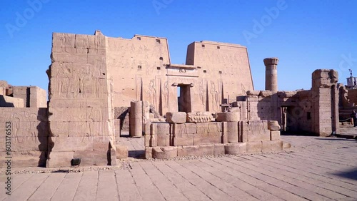 EDFU EGYPT. TRUCK RIGHT. Panoramic view of Edfu Temple. This temple is dedicated to the falcon god Horus. On the walls of the temple there are different carved reliefs.