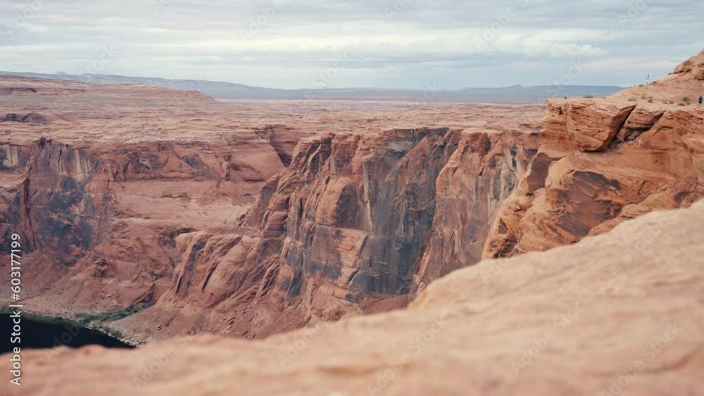 Horseshoe Bend, one of the most spectacular natural wonders in America. The Colorado River flowing peacefully through the canyon. Horseshoe Bend, one of the most spectacular natural wonders in America. The Colorado River flowing peacefully through the canyon.