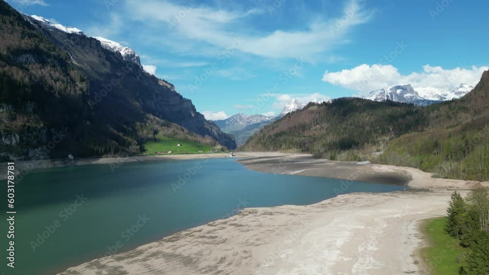 Serene and picturesque view of Klontalersee lake in Glarus,Switzerland Serene and picturesque view of Klontalersee lake in Glarus,Switzerland