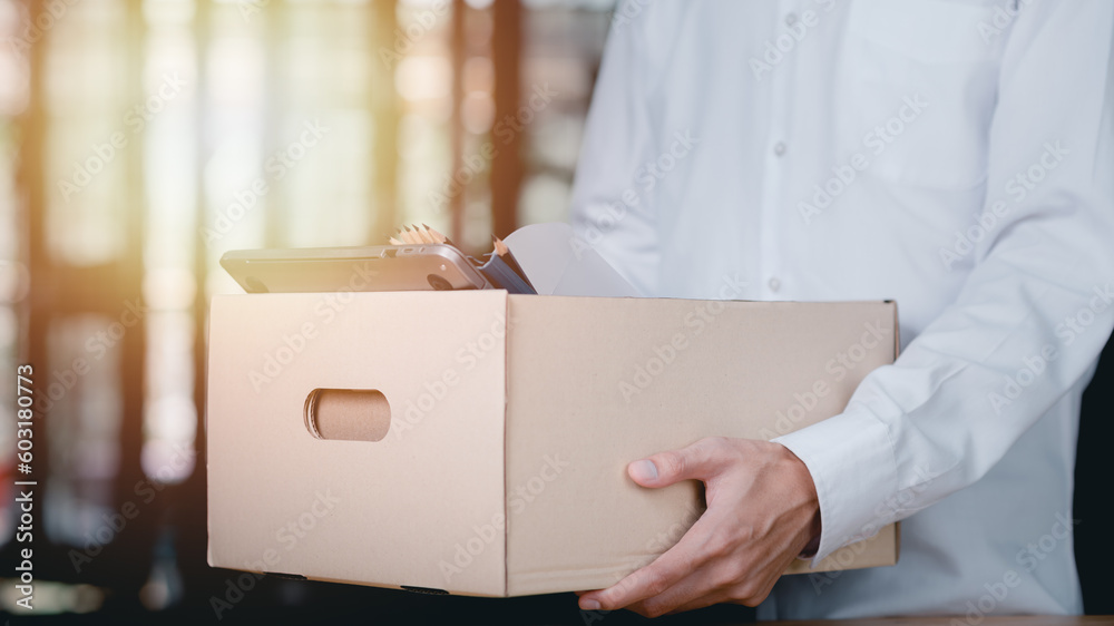 employees or unemployed holding a cardboard box ,Show termination concept ,resigned from a job, was fired or left a job ,recession problems ,bankruptcy in business ,quitting a job