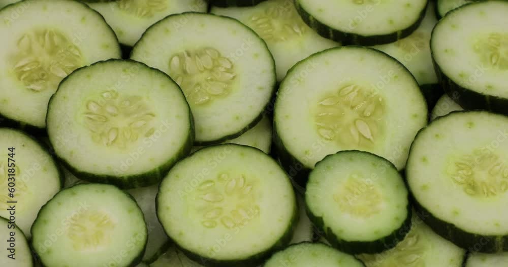 Cucumber slices rotation, Top view. Cucumber slices rotation, Top view.