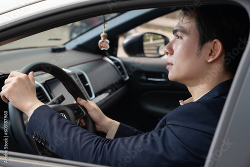 Young Asian business man with car © Timeimage