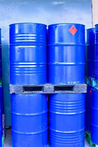 Stack of Hazardous Blue Chemical Drums or Oil Barrels, Petrochemical Industry photo