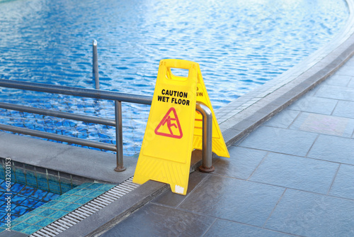 wet floor sign in swimming pool