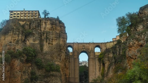 Medieval bridge and buildings of Ronda town, time lapse view