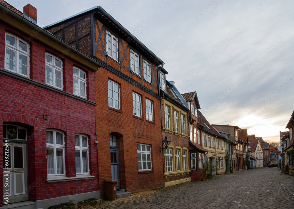 Street with Medieval old brick buildings in Luneburg. Germany