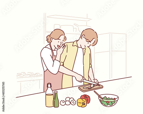 Young happy couple is enjoying and preparing healthy meal in their kitchen. Hand drawn style vector design illustrations.