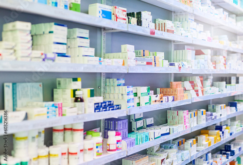 Pharmacy, shelf and boxes for product, empty or pharmaceutical stock for wellness, health and interior. Shop, store and retail healthcare with storage, choice or sale for wellness, discount and drugs