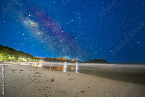 Naiharn Beach in Phuket Thailand, at night lovely view of the Milky Way. During the day it has turquoise blue waters, lush green mountains colourful skies. Nai Harn Beach photo