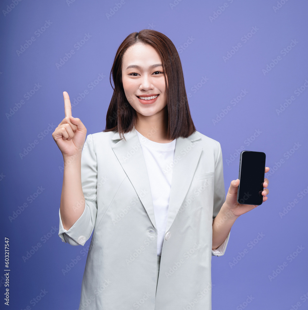 Full length photo of young Asian businesswoman on background Full length photo of young Asian businesswoman on background