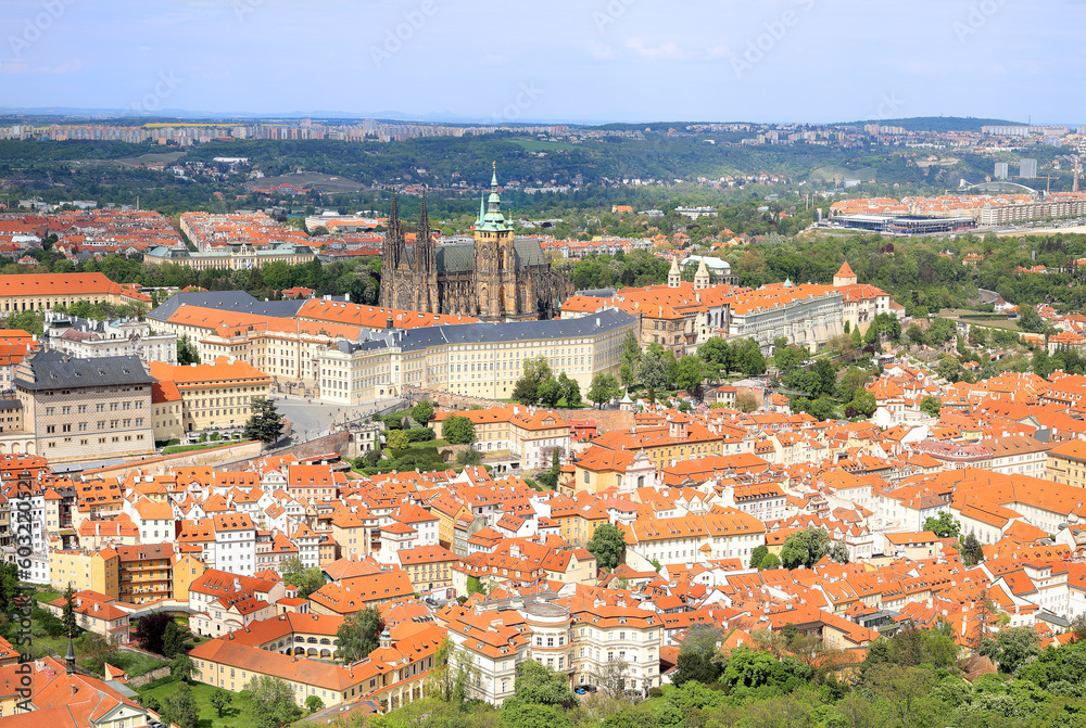 Panorama bird-eye view of the Prague Castle and the lesser town houses with red roofs in Prague, Czech Republic