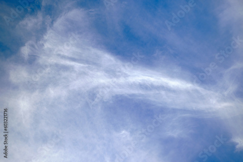 blue sky with high cirrus clouds
