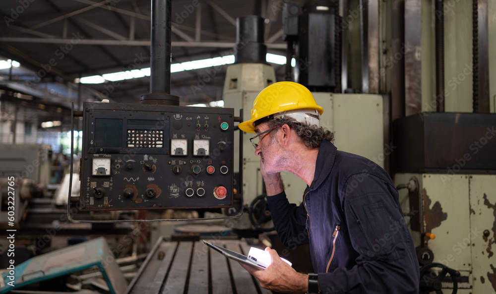 Senior technicians inspect and repair mechanical systems in machine control cabinets. in order for the machine to return to normal operation