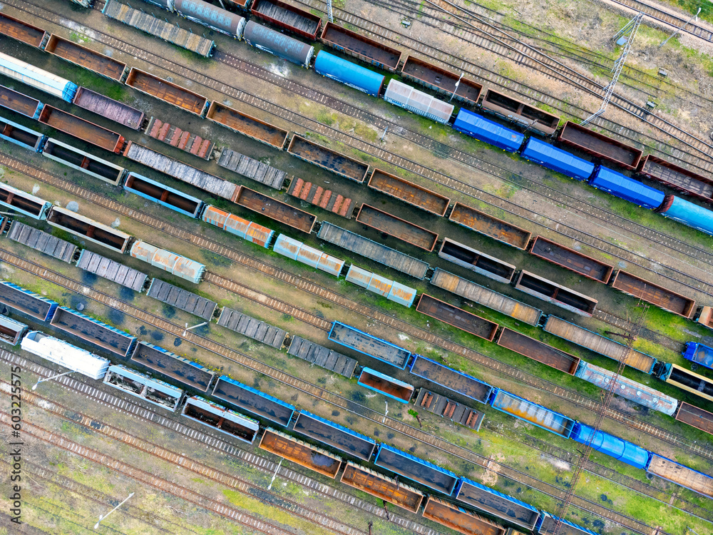 Aerial view landscape. View of trains, railroad tracks, cars, cargo. Photo from a drone. Coal transportation.