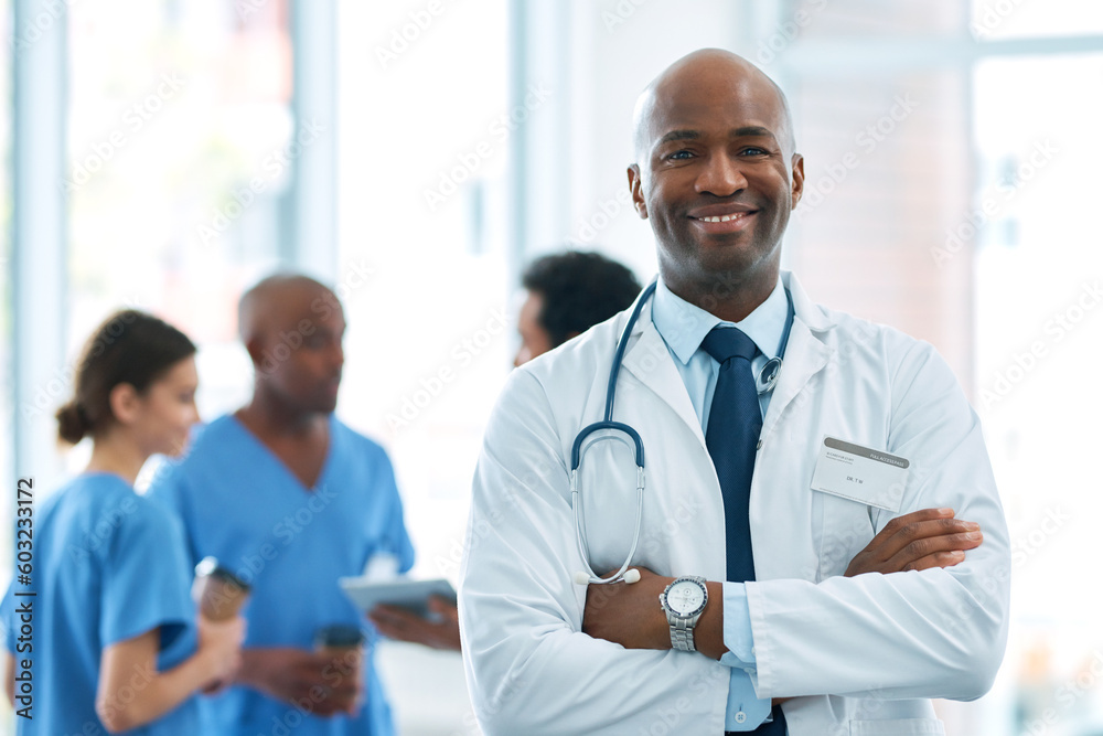 Man, leader and portrait of doctor in hospital, healthcare or clinic with medical expert nurses to trust in quality care. Black person, medicine and happy neurosurgeon, arms crossed or confidence Man, leader and portrait of doctor in hospital, healthcare or clinic with medical expert nurses to trust in quality care. Black person, medicine and happy neurosurgeon, arms crossed or confidence