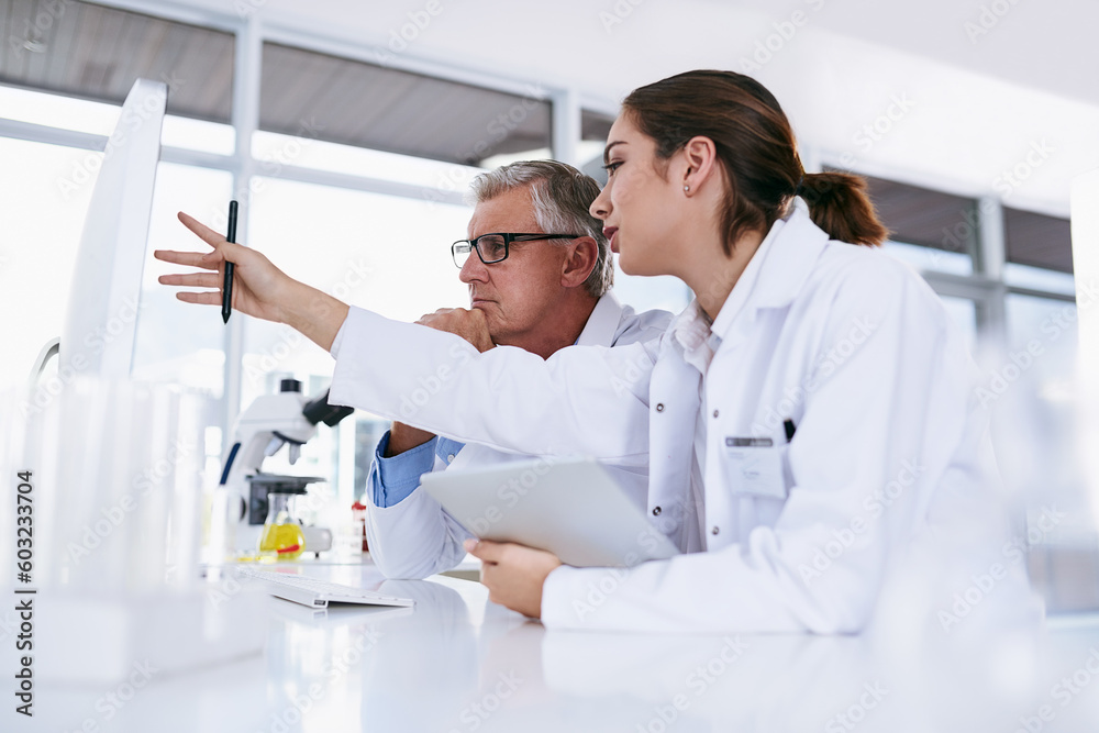 Scientist, tablet and teamwork in science experiment, results or collaboration on computer at the laboratory. Woman and man mentor in medical research working together on pc with scientific student Scientist, tablet and teamwork in science experiment, results or collaboration on computer at the laboratory. Woman and man mentor in medical research working together on pc with scientific student