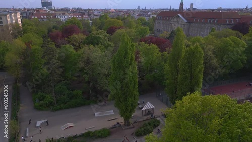 Wallpaper Mural Skateboarding in front of Constitutional court berlin. Beautiful aerial top view flight 
skater park, city district Shoeneberg, Germany spring 2023. panorama overview drone
4k uhd cinematic footage. Torontodigital.ca