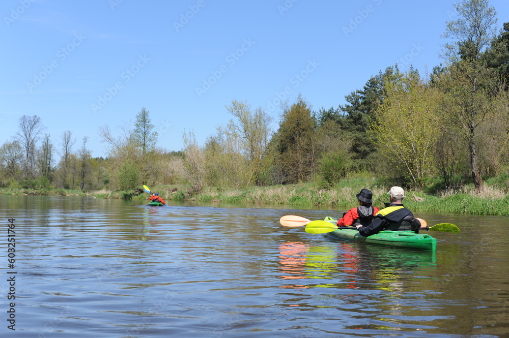Kayaking in a kayak on the river on a sunny day in summer in Europe