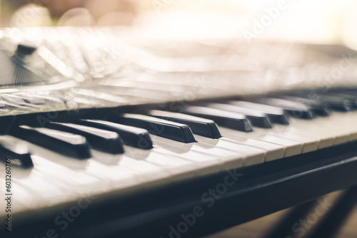 Piano keyboard background was set up in the music room by the windows in the morning to allow the pianist to rehearse before the classical piano performance in celebration of the great success.