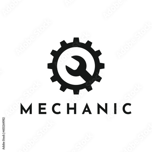 Simple gear and wrench mechanic logo design concept