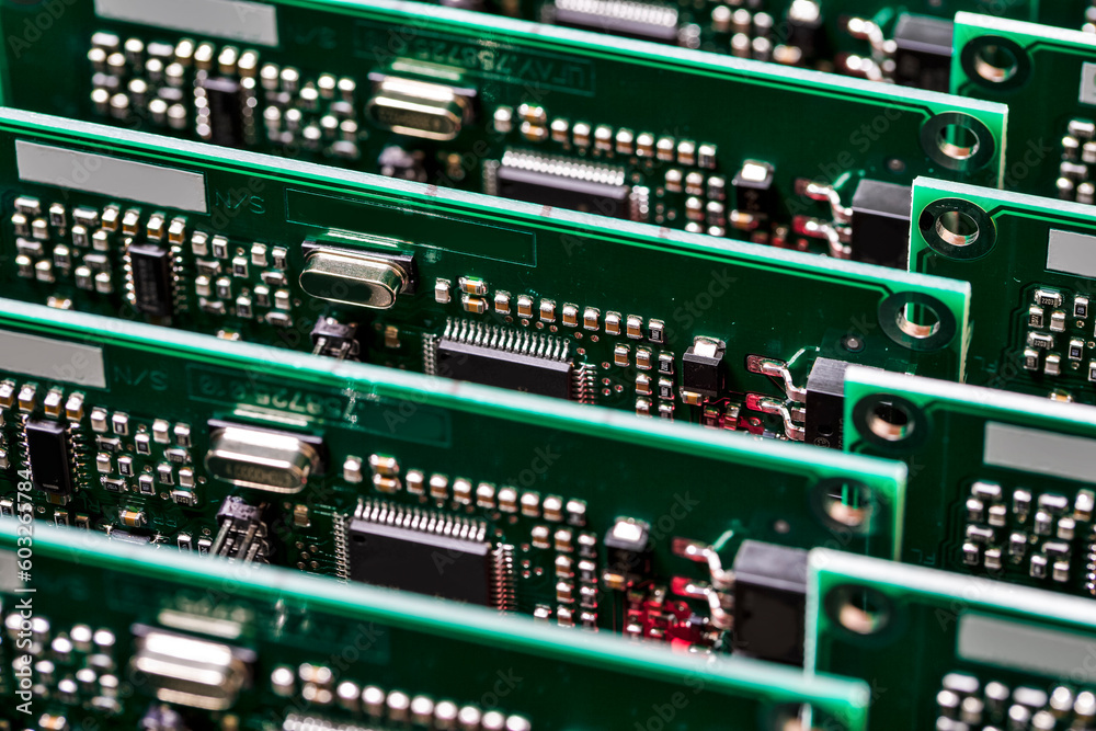 Electronics Ideas. Closeup View of Batch of Ready ABS Automotive Printed Circuit Boards with Number of Soldered Surface Mounted Components. Electronics Ideas. Closeup View of Batch of Ready ABS Automotive Printed Circuit Boards with Number of Soldered Surface Mounted Components.