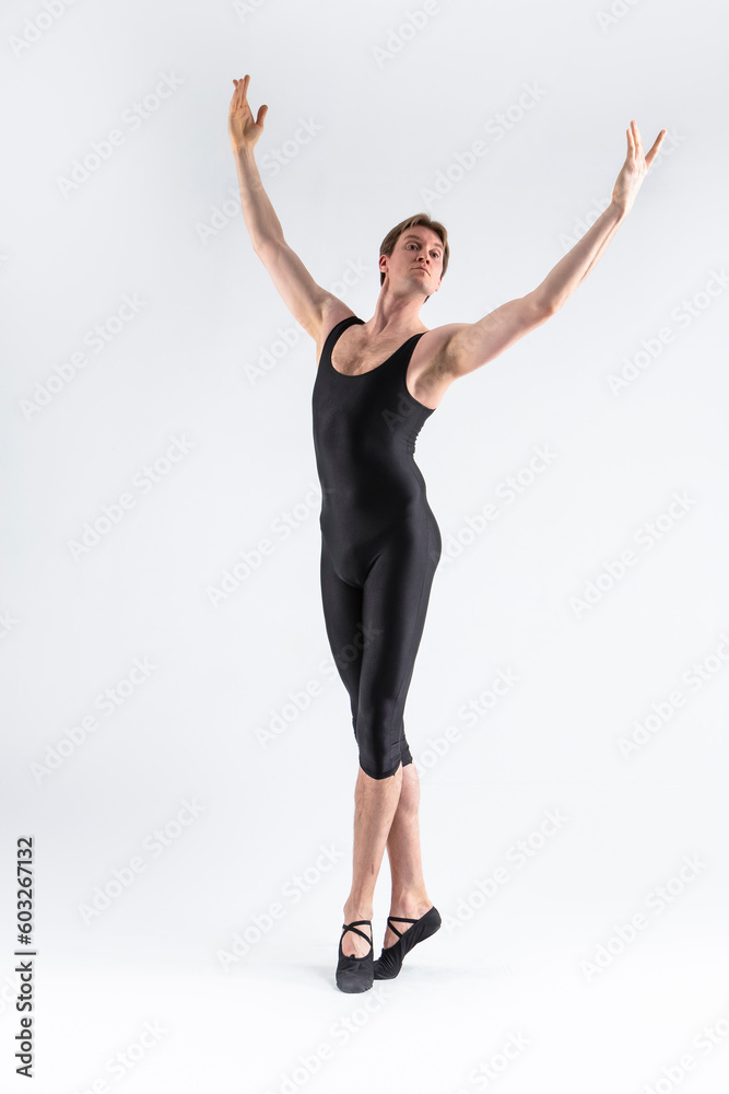 Caucasian Male Ballet Dancer Flexible Athletic Man Posing in Black Tights in Ballanced Dance Pose Caucasian Male Ballet Dancer Flexible Athletic Man Posing in Black Tights in Ballanced Dance Pose