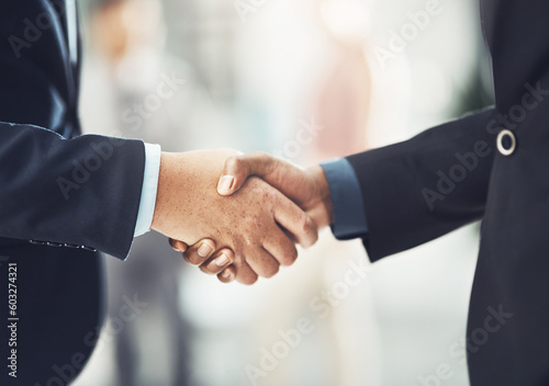Business people, handshake and meeting in partnership, b2b or deal agreement at the office. Businessman shaking hands for hiring, recruitment or corporate growth in teamwork, welcome or introduction