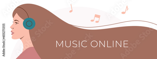 Beautiful young woman walking in a wireless headphones listening to a music.