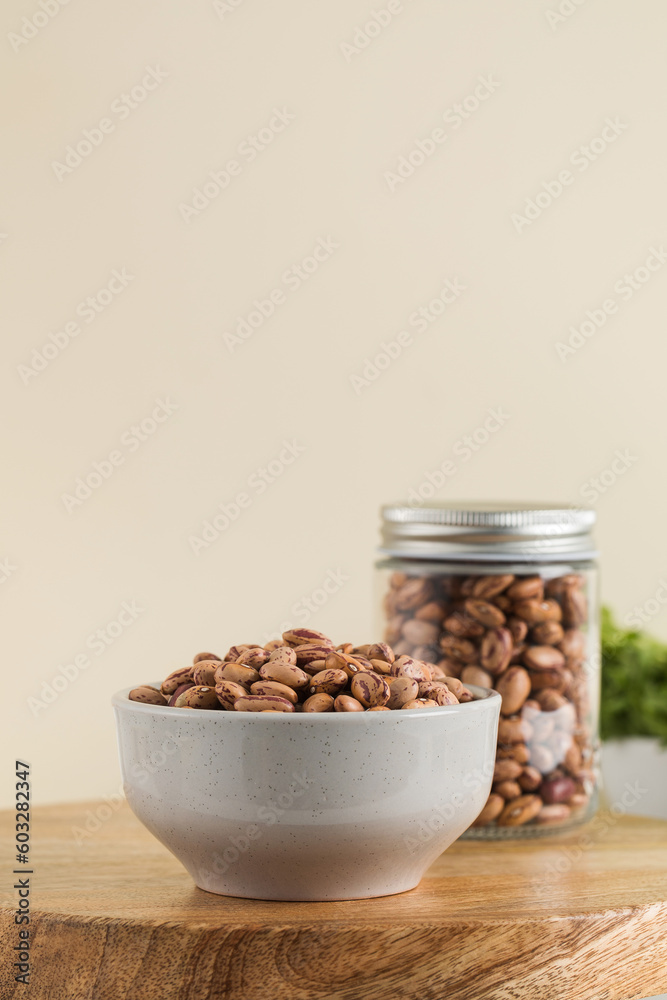 Raw pink beans in a bowl. Protein protein. Healthy eating. Raw pink beans in a bowl. Protein protein. Healthy eating.