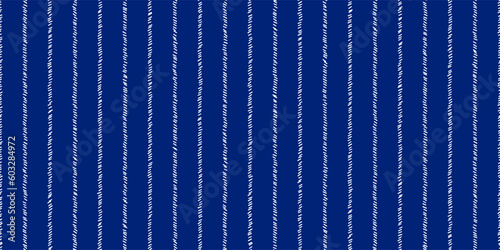 Pinstripe blue and white seamless pattern with narrow sketchy lines. Classic wool suit fabric. Elegant masculine design. Simple monochrome background. Twill variegated woolen material