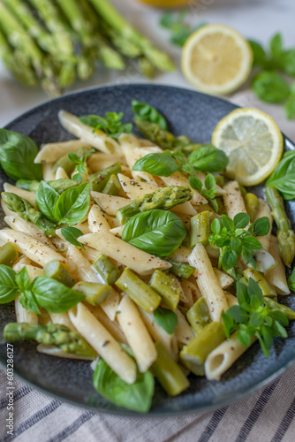 Pasta primavera with asparagus, snap peas photo