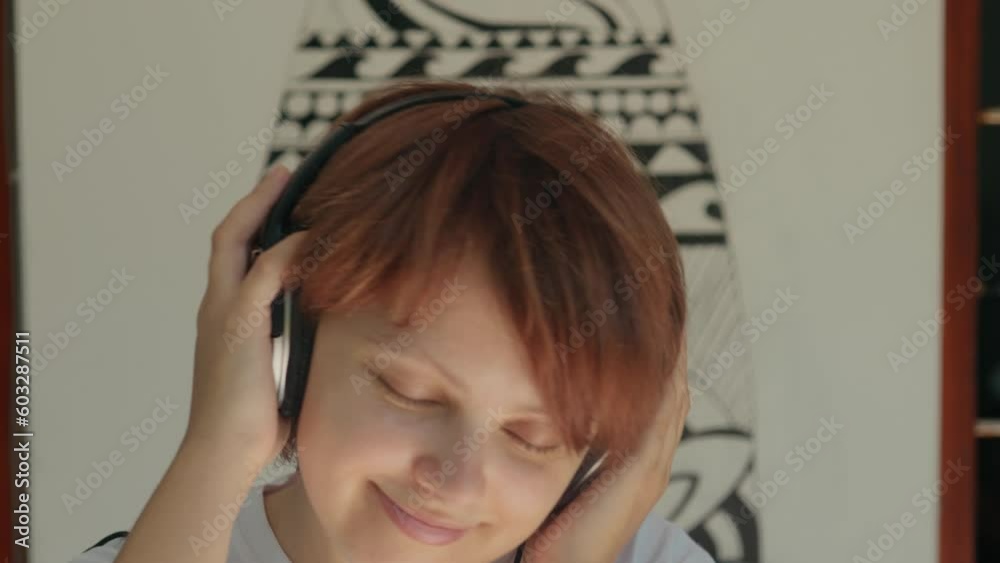 Happy girl with headphones dancing. Happy girl with headphones dancing.