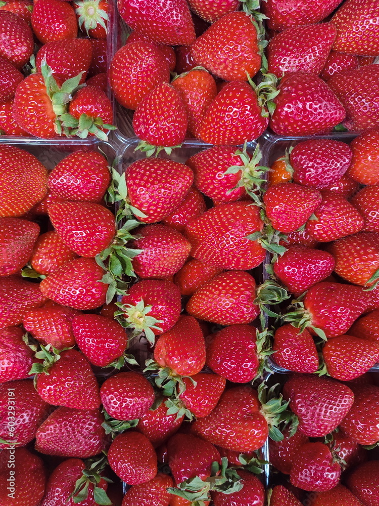 Top view of fresh and mellow red strauberries in a box Top view of fresh and mellow red strauberries in a box
