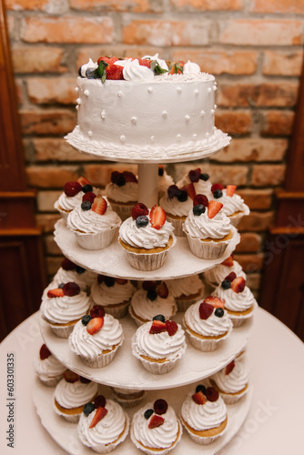 Delicious fancy wedding cake made of cupcakes