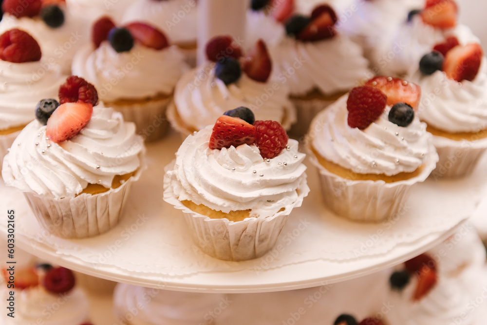 Delicious fancy wedding cake made of cupcakes