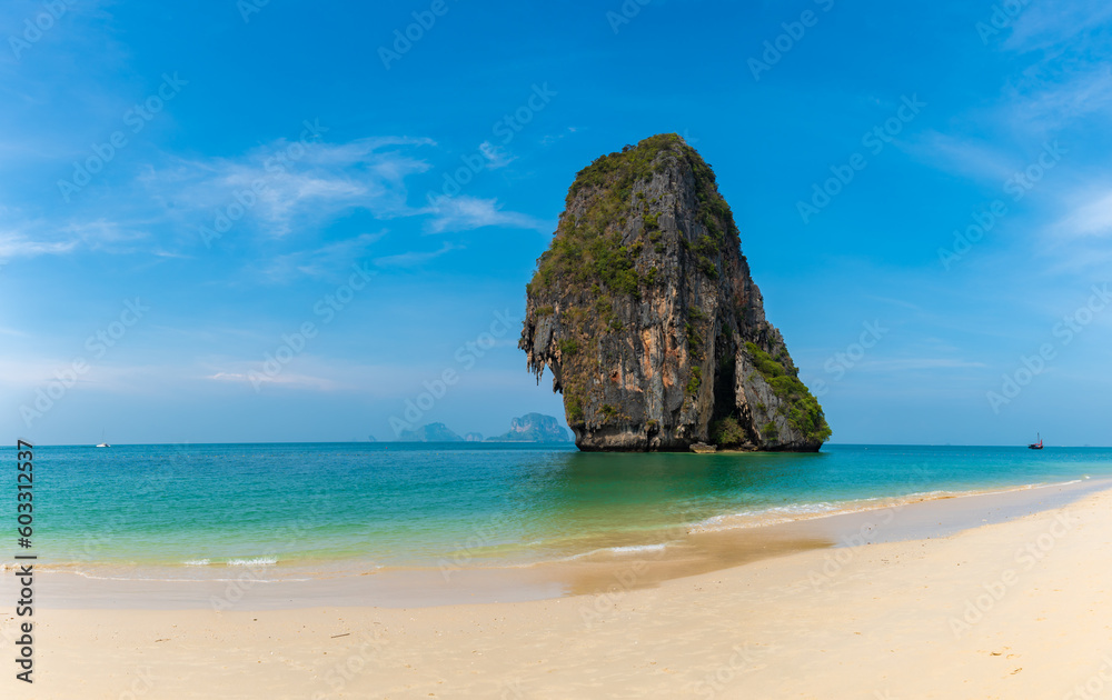 horizontal wide angle panorama, phra nang beach in Thailand, paradise, sunny beach, sunbathing and swimming in the sea, blue ocean and sky, relaxation and enjoyment, rock koh rang nok horizontal wide angle panorama, phra nang beach in Thailand, paradise, sunny beach, sunbathing and swimming in the sea, blue ocean and sky, relaxation and enjoyment, rock koh rang nok