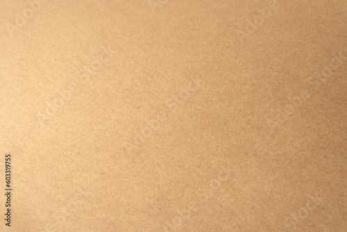 Organic craft soft light brown or beige recycled cardboard box color blank paper texture environmental friendly background with space photo