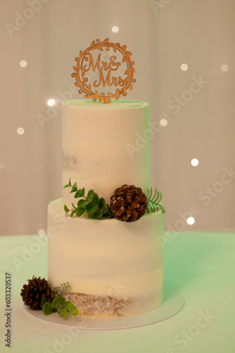 Wedding cake with Mr & Mrs sign & acorns