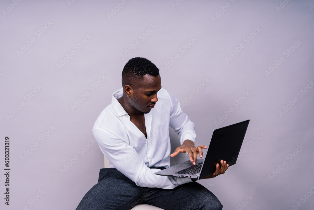 African American millennial businessman isolated on studio background, successful male formal suit African American millennial businessman isolated on studio background, successful male formal suit