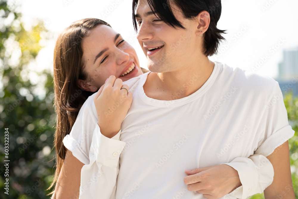 Romantic young couple in love happy romance relationship together. Portrait of handsome man and his beautiful girlfriend embracing with affection. Lover enjoying valentine, honeymoon or dating. Romantic young couple in love happy romance relationship together. Portrait of handsome man and his beautiful girlfriend embracing with affection. Lover enjoying valentine, honeymoon or dating.