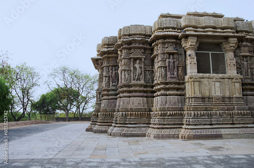 Outer view of the Sun Temple on the bank of the river Pushpavati. Built in 1026 - 27 AD during the reign of Bhima I of the Chaulukya dynasty, Modhera village of Mehsana district, Gujarat, India photo