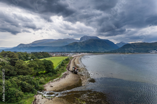 Fort William, Scotland, United, Kingdom. Old boat of Caol, Ben Nevis aerial view, drone, cloudy day,  photo