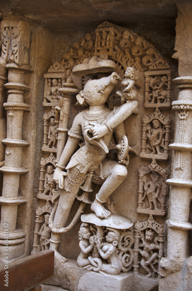 Obraz premium Varaha Sculpture, Inner wall of Rani ki vav, an intricately constructed stepwell on the banks of Saraswati River. Patan in Gujarat, India.