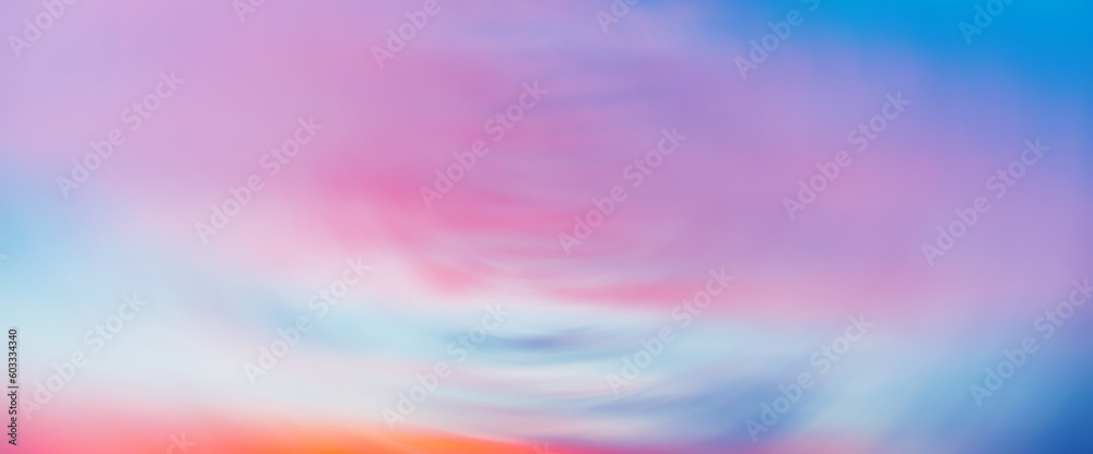 Beautiful backdrop of sunset sky with pink orange light clouds in blue sky. Colorful smooth dawn sky gradient. Nature background of sunrise. Amazing morning heaven. Slightly cloudy evening atmosphere.