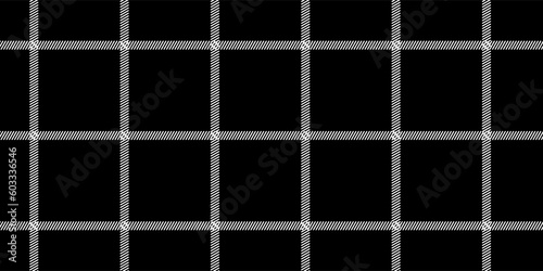 Windowpane plaid black and white seamless pattern with narrow lines. Classic wool suit fabric. Elegant masculine design. Simple monochrome background. Twill variegated woolen material