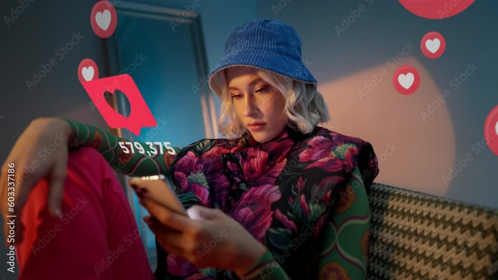 Blonde young trendy woman using her phone to interact with social media, getting followers, likes, emoji feedback