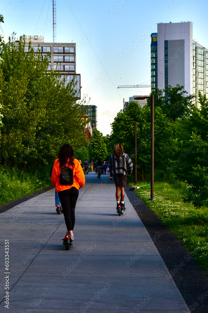 People riding electric scooters on the Atlanta Beltline People riding electric scooters on the Atlanta Beltline