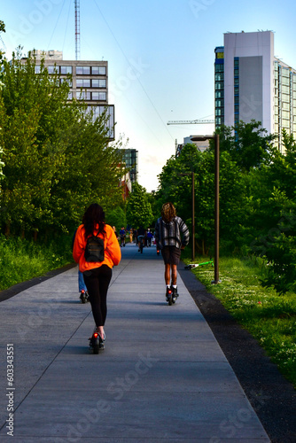 People riding electric scooters on the Atlanta Beltline