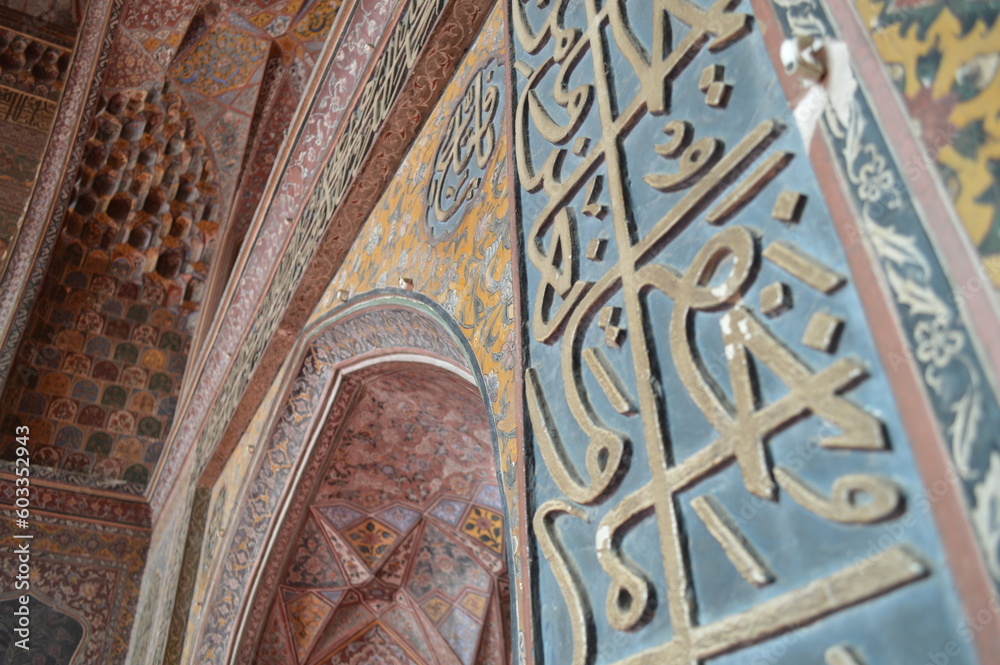  LAHORE, PAKISTAN, JULY 05, 2018: close up view of calligraphy engraved on the mosque of wazir khan, selective focus